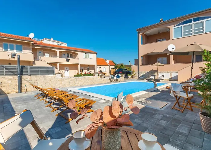 In Апартаменты *